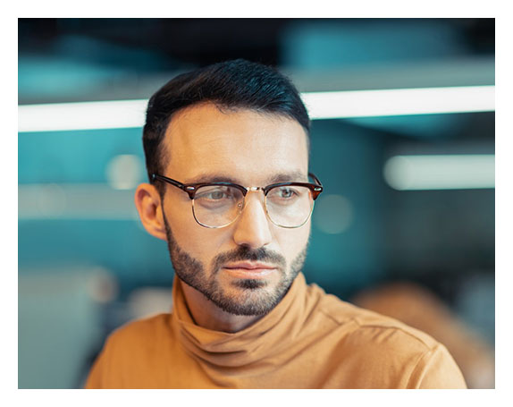 Man with custom glasses and frames at Dietz McLean Optical