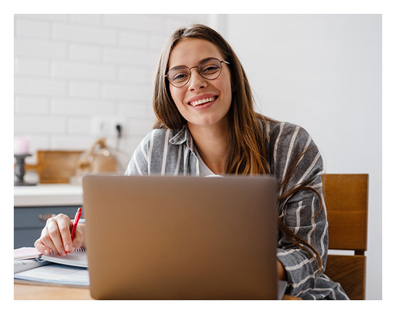 Woman with custom eyeglasses and frames at Dietz McLean Optical