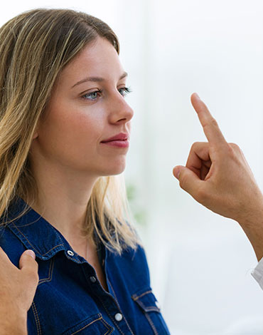 Woman getting eye exam