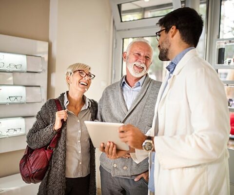 eye doctor interacting with patients