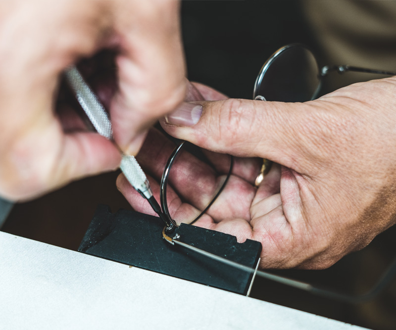 Dietz McLean technician adjusting and repairing eyeglasses