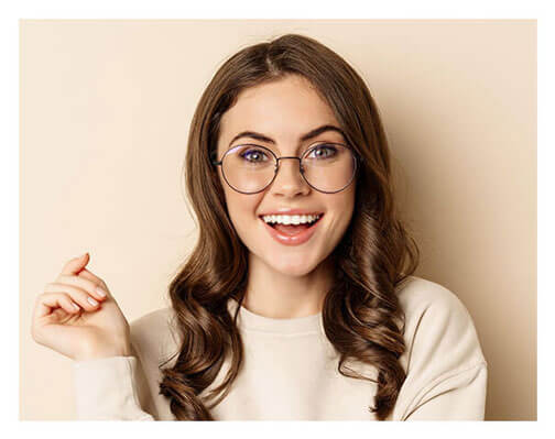 Wman wearing Dietz-McLean Optical specialty fit glasses smiling